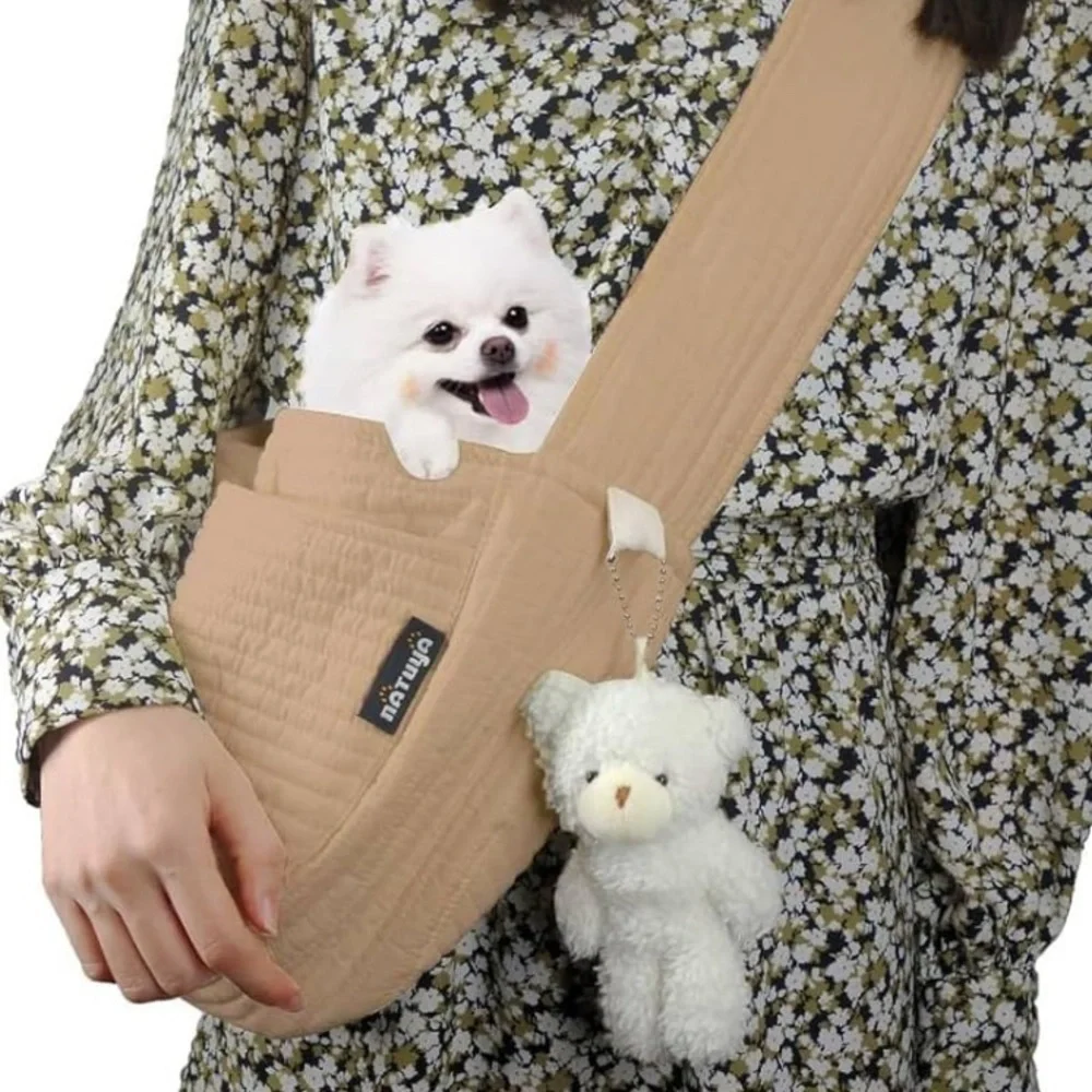 Brand new. Tan Pet Sling Carrier for small pets.